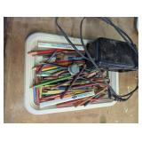 Tray of Colored Pencils and Electric Pencil Sharpe