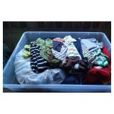 Plastic Storage Bin Containing Assorted Clothing a