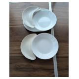 White Ceramic Dinner Plates and Crescent-Shaped Si