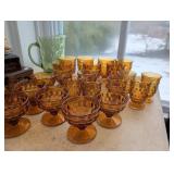 Amber-Colored Pressed Glass Stemware and Green Pre
