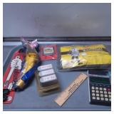 Items Lot Including Calculator, Raincoat, Wall-Han