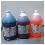 Three Gallon-Sized Bottles of Flavored Syrup