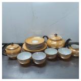 Porcelain Tea Set Featuring Teapot, Sugar Bowl, Cr