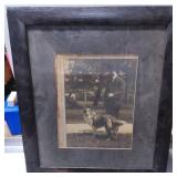 Framed Sepia-Toned Photograph of a Man with a Dog