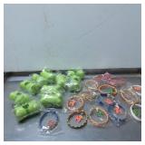 Plastic Bone Containers and Assorted Bracelets