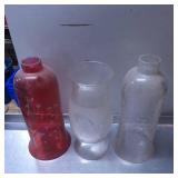 Three Glass Lamp Chimneys in Red and Clear Tones