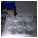 Six Clear Ribbed Glass Goblets with Footed Base