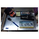 Miscellaneous Items Including Hat, License Plate,