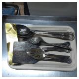 Silver-Colored Flatware and Utensil Set with Decor