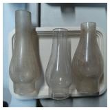 Three Glass Oil Lamp Chimneys in Varied Shapes