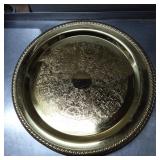 Round Brass Colored Serving Tray with Embossed Orn