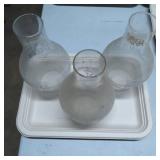 Three Glass Lamp Chimneys with Curved Neck Design