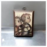 Framed Print of Two Children in Brown Wooden Frame