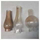 Three Glass Lamp Shades of Varying Heights