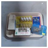 Light Bulbs and Electrical Accessories on Wooden T