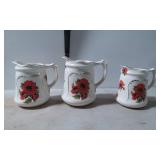 Three Ceramic Pitchers with Red Poppy Design