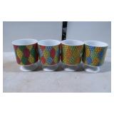 Four Ceramic Pedestal Cups with Multicolor Harlequ