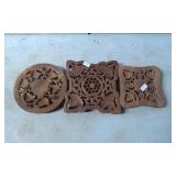 Three Hand-Carved Wooden Trivets with Ornamental D