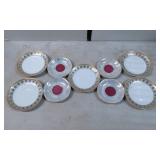 9 Saucer Plates: 4 Iridescent with Red Centers and