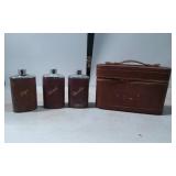 Leather-Cased Set of Three Glass Liquor Bottles wi