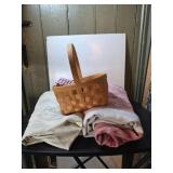 Three Tablecloths and Woven Basket