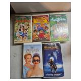 Five VHS Tapes Including Animated and Feature Film