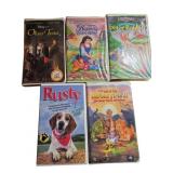Five VHS Tapes Featuring Animated and Thematic Con