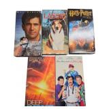 Five VHS Movie Tapes Featuring Family and Action T