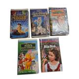 Five VHS Tapes Including Disney and Shirley Temple
