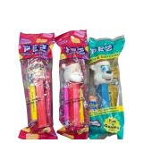 Three PEZ Dispensers in Original Packaging Featuri