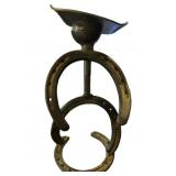 Horseshoe and Metal Hat Sculpture