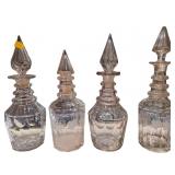 Four Etched Glass Decanters with Stoppered Tops