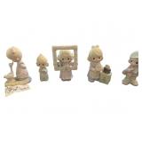 Precious Moments Figurines with Themed Designs