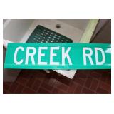Creek Road Sign