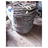 Spool of woven fence wire