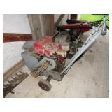 Concrete scarifier/planer