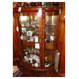 Antique bow front claw foot China cabinet