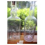 Antique maple syrup bottles
