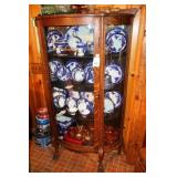 Antique bow front China cabinet