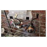 LOT - (2) FISHING REELS & (2) STORAGE CASES