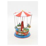VINTAGE TIN LITHO CAROUSEL TOY W/ ROCKETS