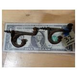 2ct Old Cast Iron Coat Hangers