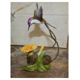 Ceramic Hummingbird Figurine On Flower