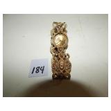 Gold Tone Ladies Watch w/ Eccentric Band (broken)