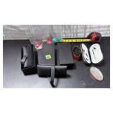 lot of darts and eyeglasses holder