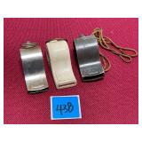 Vtg.  Police or sports whistles