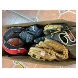 Baseball gloves and batters hat