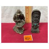 Resin gold miner and wooden statue