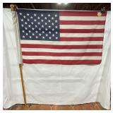 US Flag with wooden pole