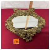 ornate brass or gilt metal tabletop mirror,